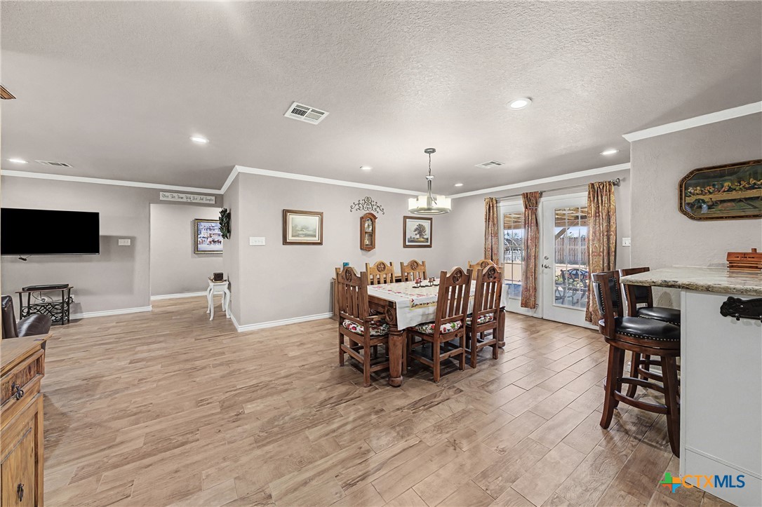 1601 Sunset Circle Cameron, TX 76520 - Photo 22 of 40 a view of a dining room with furniture
