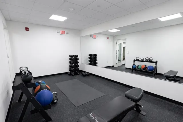 a room with furniture and air hockey table