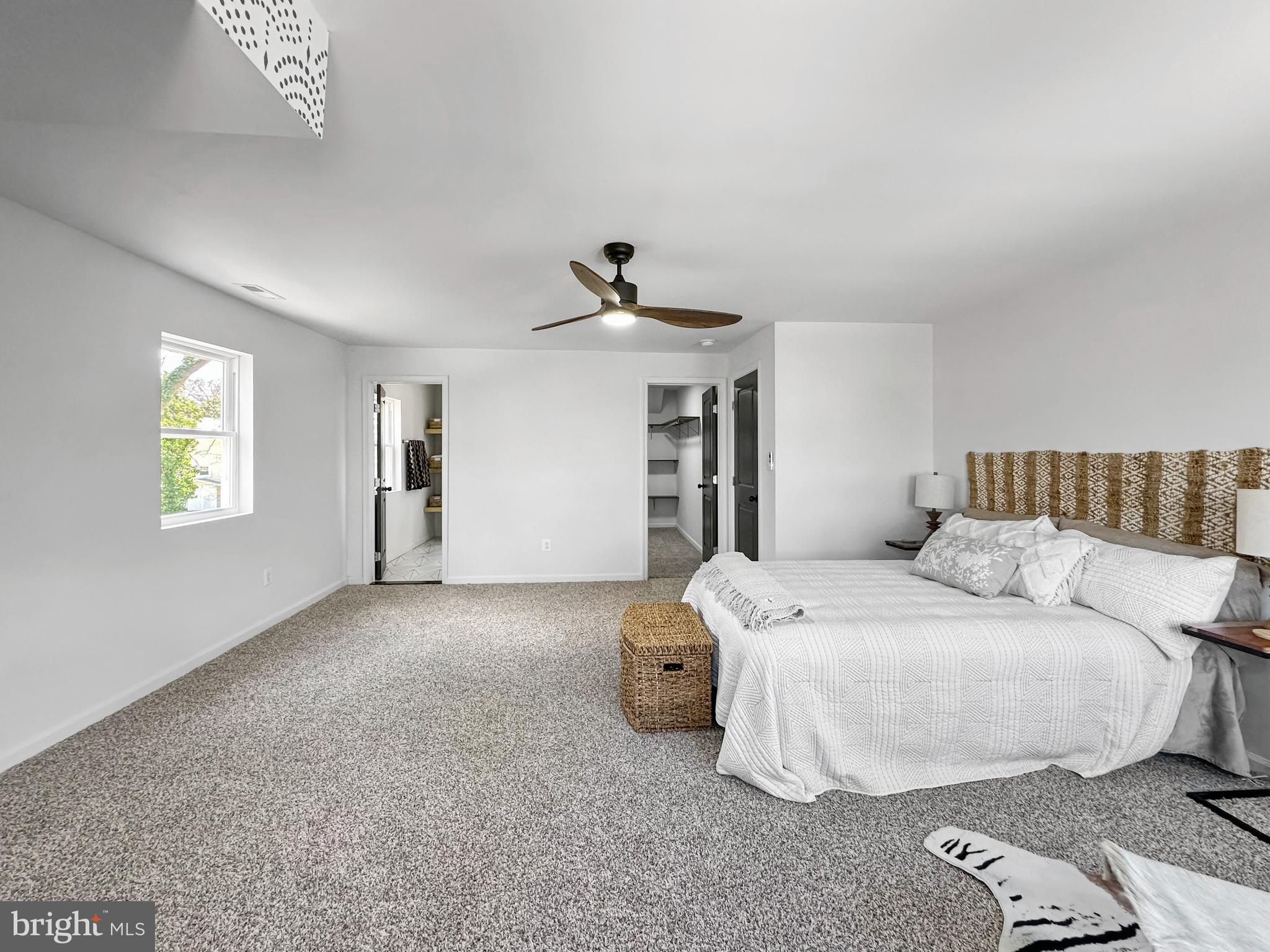 4309 Queensbury Road Riverdale, MD 20737 - Photo 32 of 63 a bedroom with a bed and a window