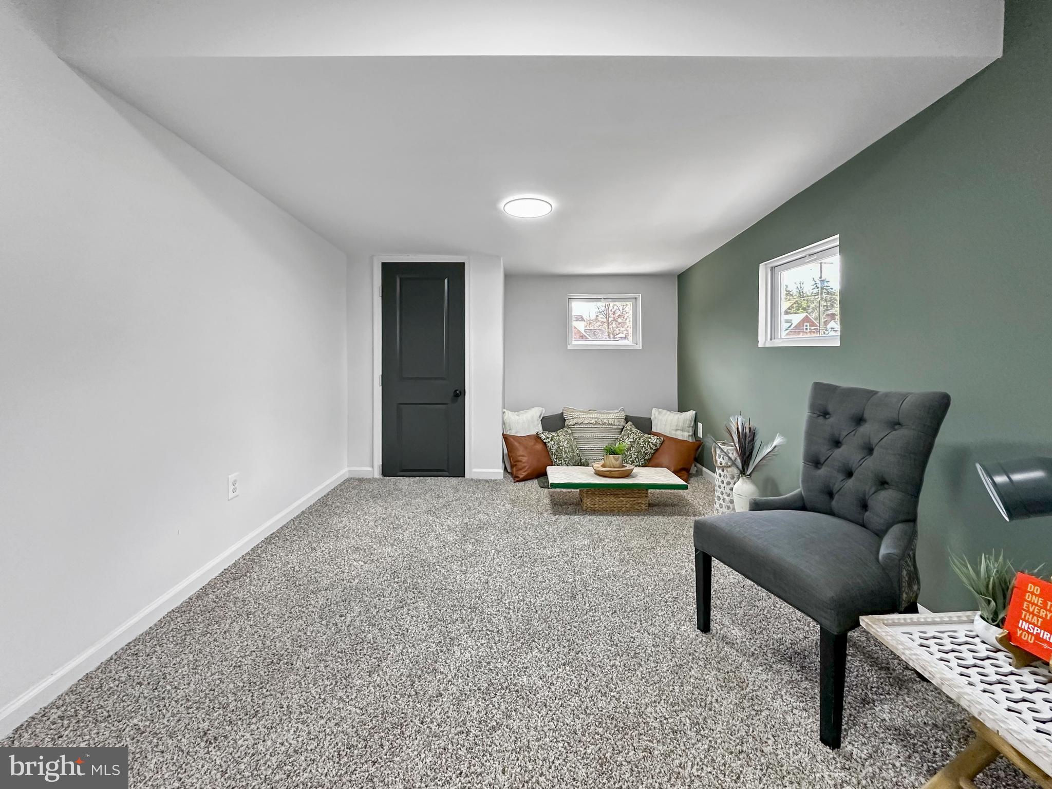 4309 Queensbury Road Riverdale, MD 20737 - Photo 44 of 63 a living room with furniture and a couch