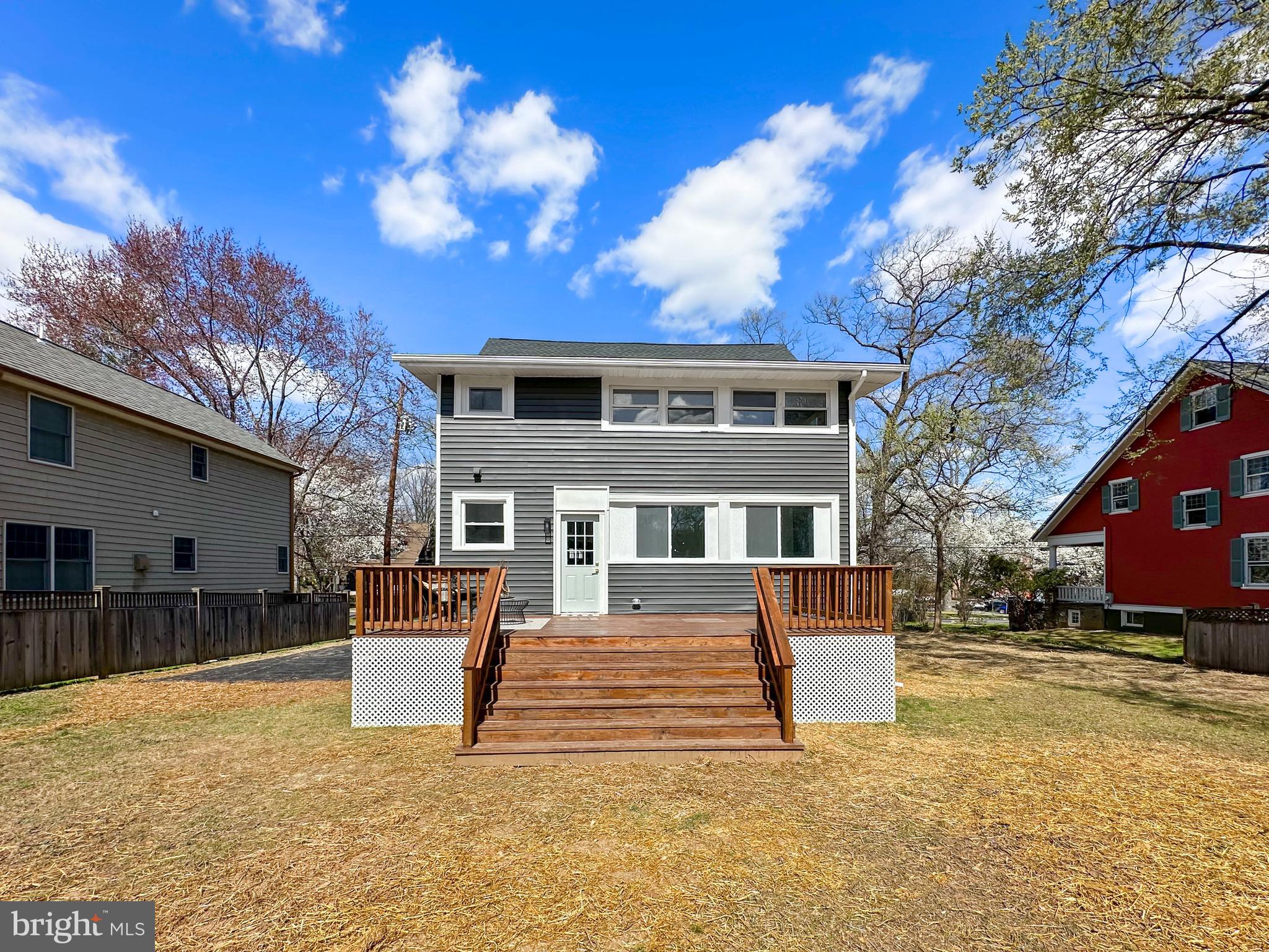 4309 Queensbury Road Riverdale, MD 20737 - Photo 59 of 63 a front view of a house with a yard