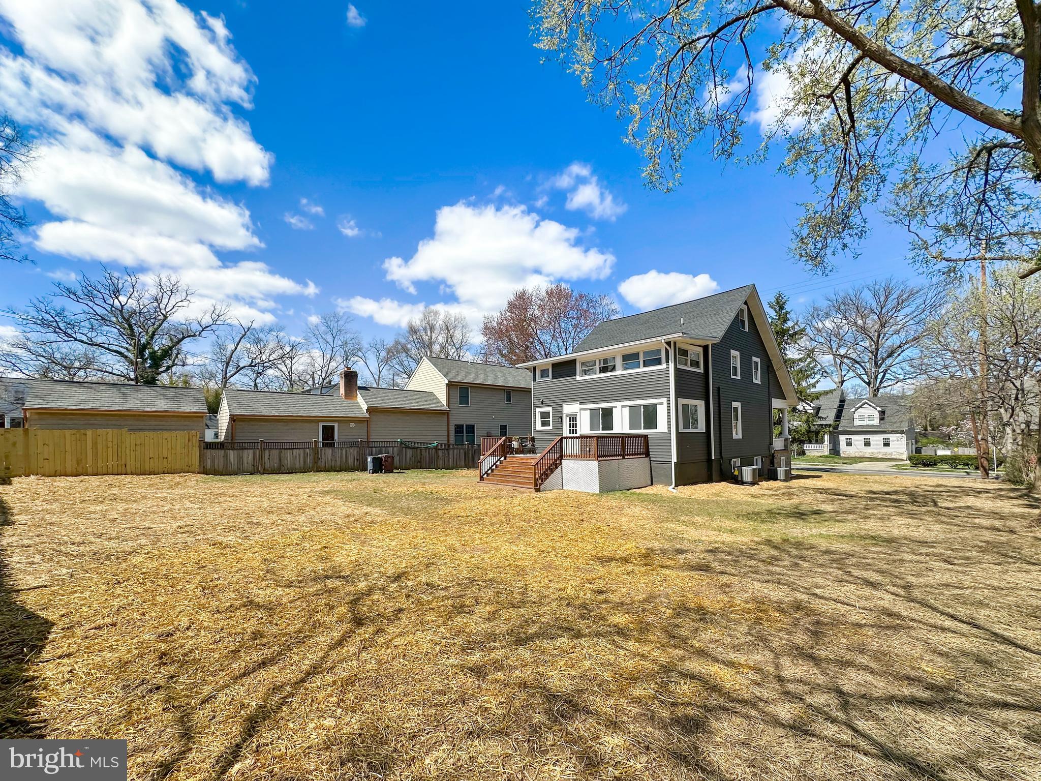 4309 Queensbury Road Riverdale, MD 20737 - Photo 62 of 63 a large building with trees in front of it