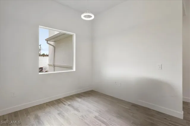 an empty room with a window