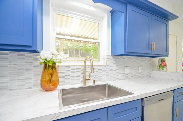 a bathroom with a sink and a bathtub