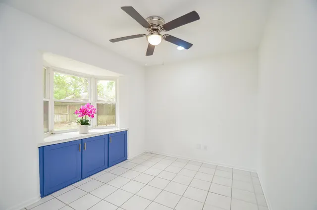 a kitchen with a sink and window