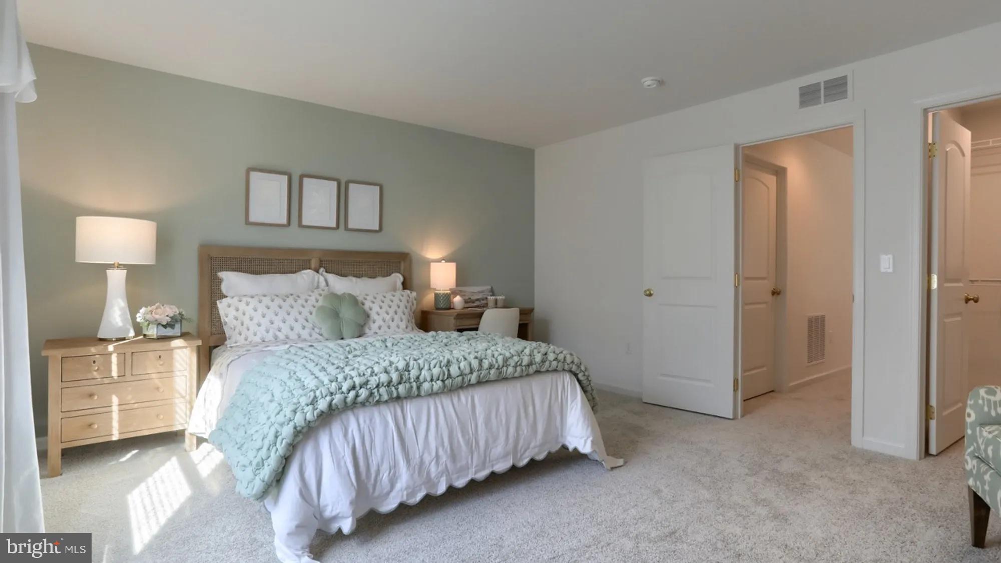 104 Flora Boulevard Lebanon, PA 17042 - Photo 11 of 20 a bedroom with a bed and a lamp