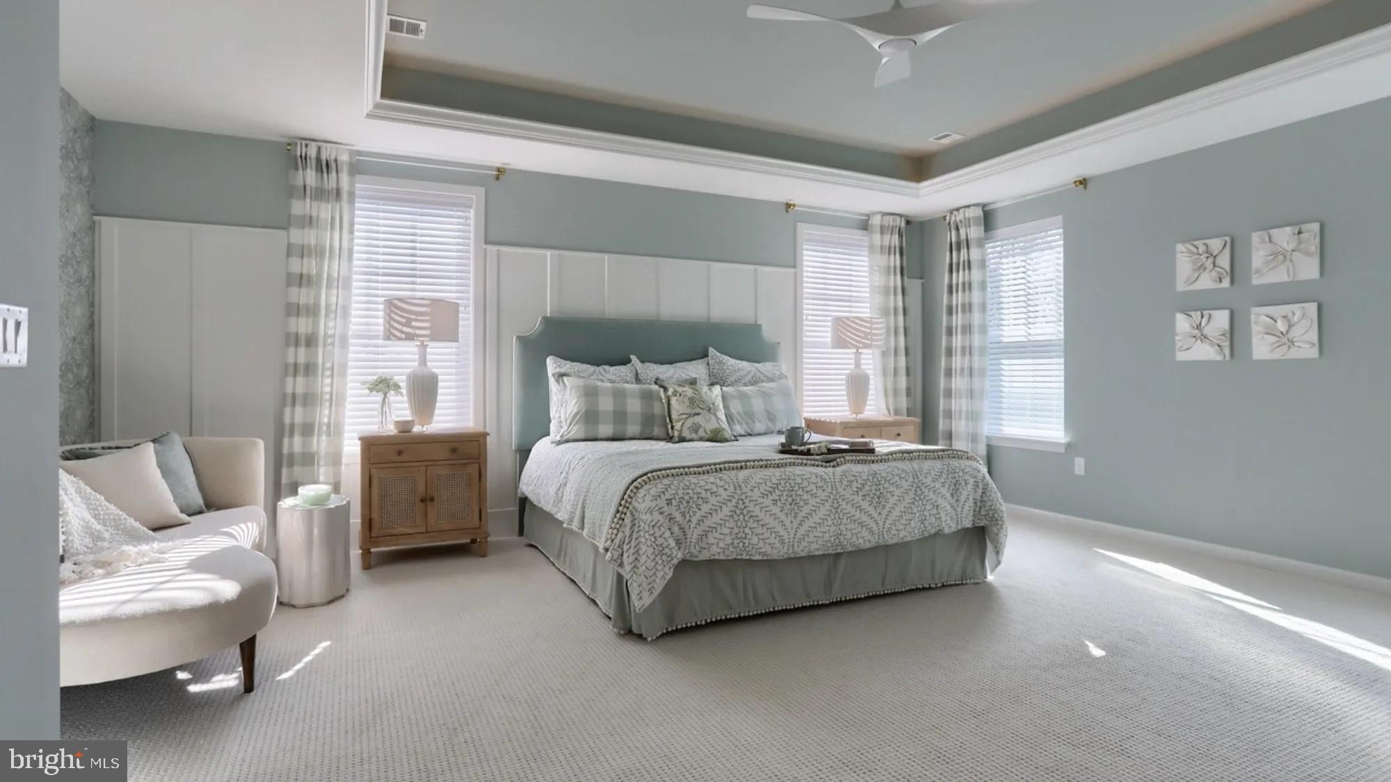 104 Flora Boulevard Lebanon, PA 17042 - Photo 14 of 20 a spacious bedroom with a bed and a couch