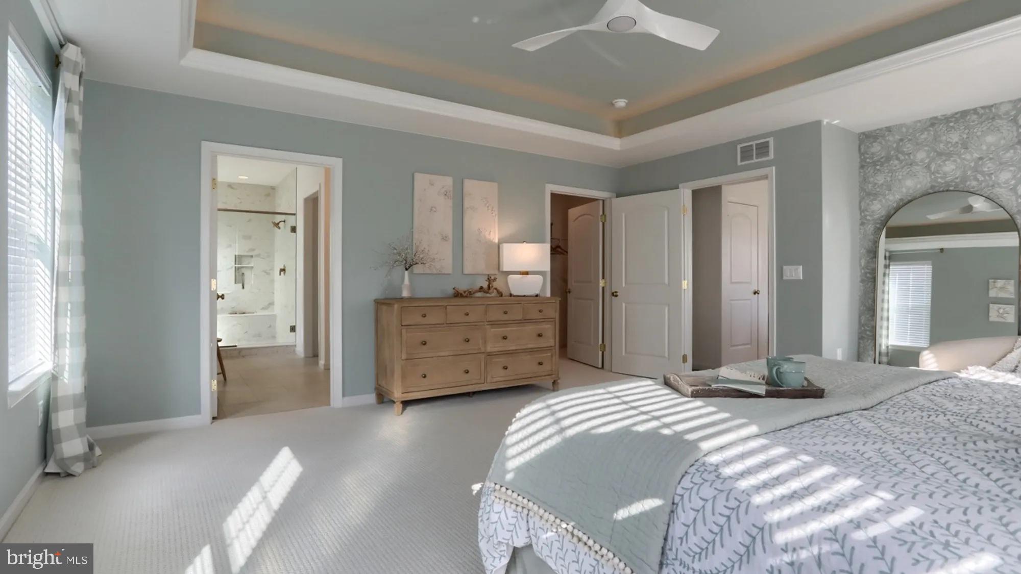 104 Flora Boulevard Lebanon, PA 17042 - Photo 16 of 20 a bedroom with a bed and a chandelier