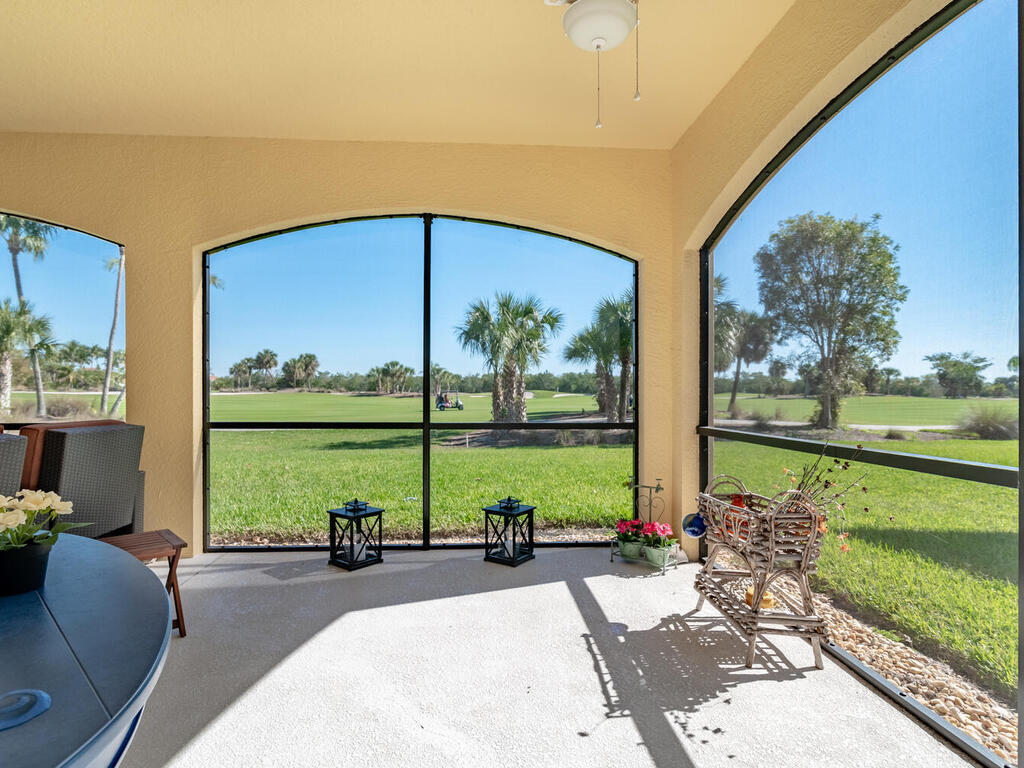 1276 Rialto Way, Unit 102 Naples, FL 34114 - Photo 12 of 37 a view of swimming pool from a balcony