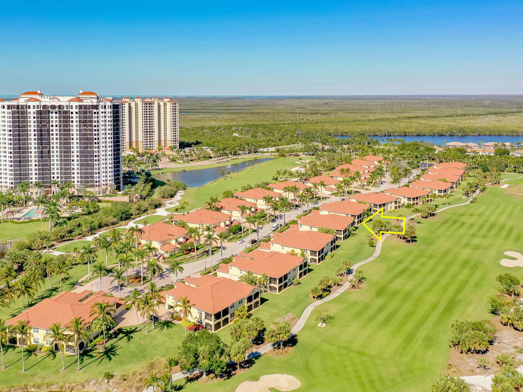 1276 Rialto Way, Unit 102 Naples, FL 34114 - Photo 26 of 37 a view of an ocean