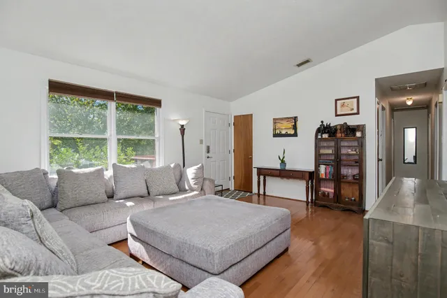 a living room with furniture and window
