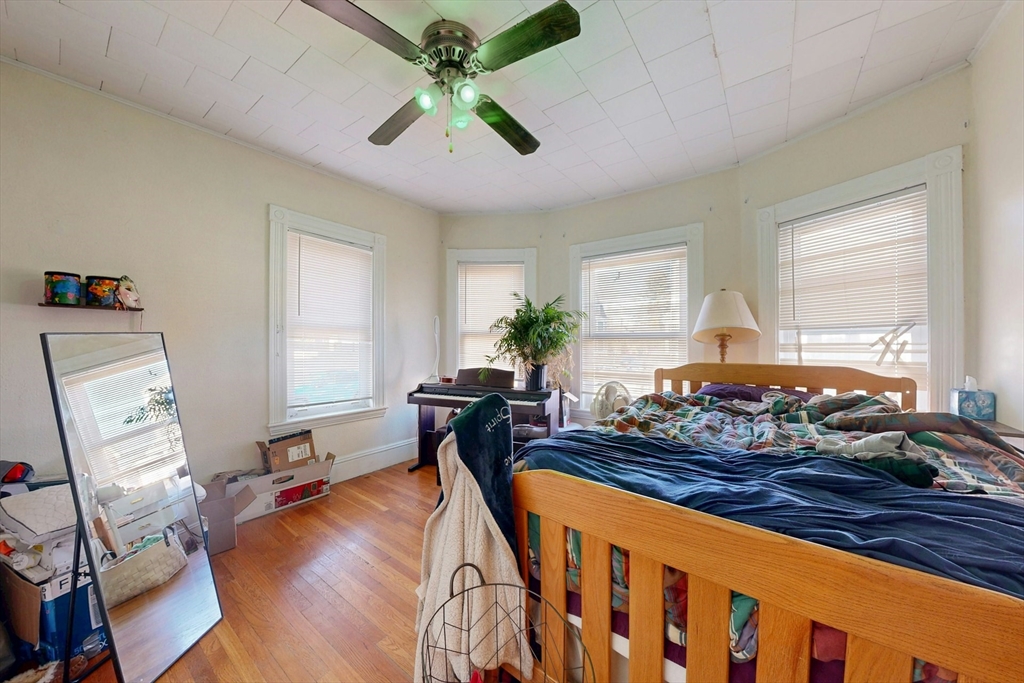 58 Dearborn Street Medford, MA 02155 - Photo 13 of 38 a bed room with furniture and a window