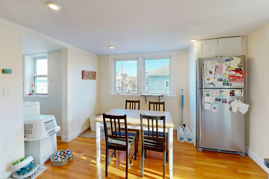 58 Dearborn Street Medford, MA 02155 - Photo 18 of 38 a view of a dining room with furniture window and wooden floor