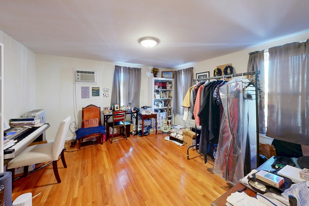 58 Dearborn Street Medford, MA 02155 - Photo 24 of 38 a bed room with furniture and a window