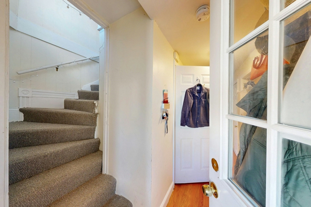 58 Dearborn Street Medford, MA 02155 - Photo 27 of 38 a view of walk in closet with clothes and shoes