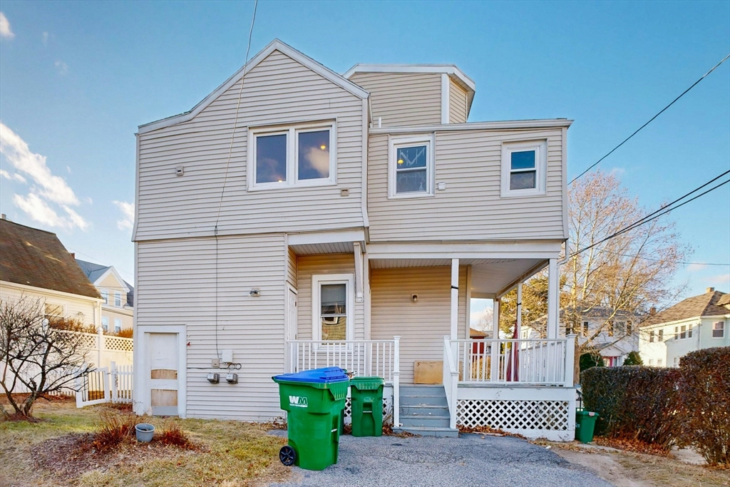 58 Dearborn Street Medford, MA 02155 - Photo 35 of 38 a front view of a house with a garage