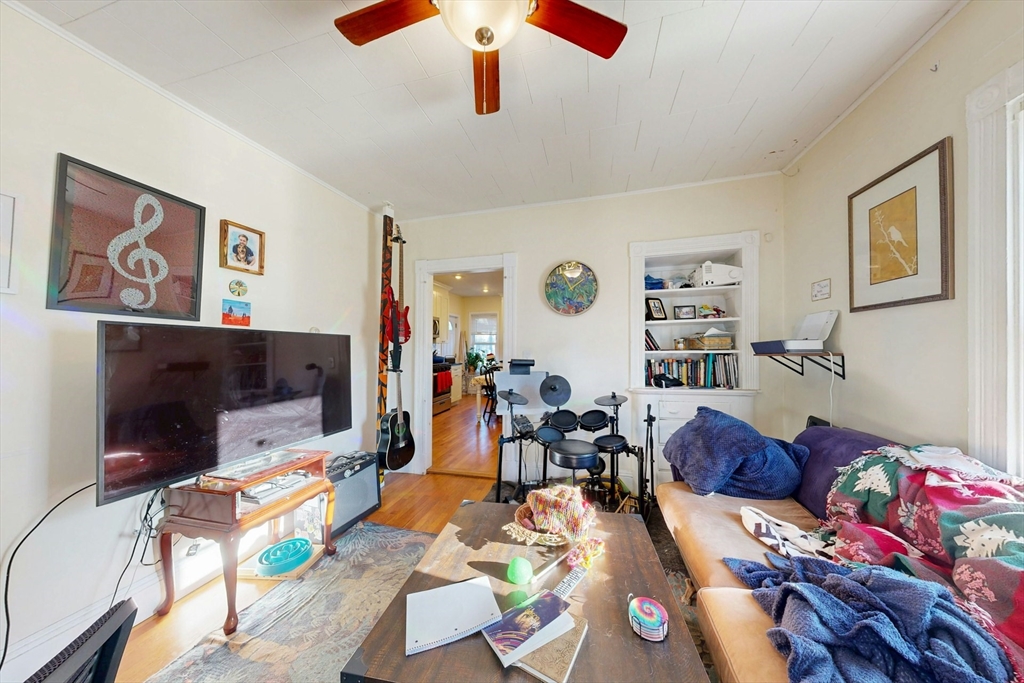 58 Dearborn Street Medford, MA 02155 - Photo 8 of 38 a living room with furniture and a flat screen tv