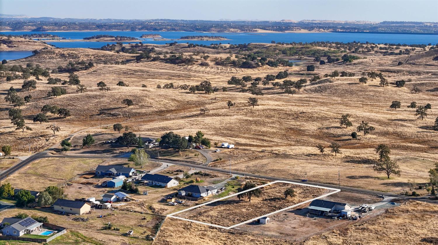 an aerial view of residential building and parking space