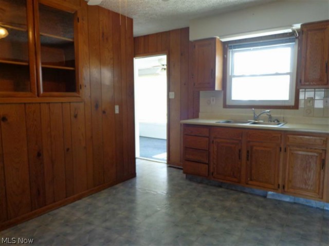 Here we are looking back from the entrance to the living room into the kitchen and on into the sunroom.