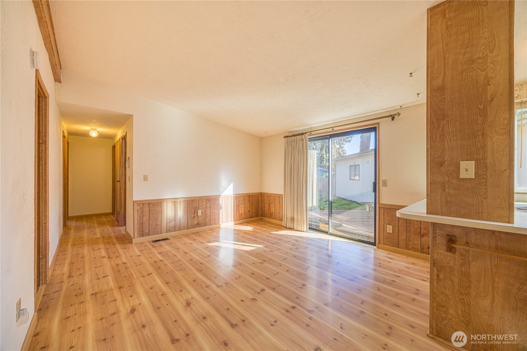 20 Ed's Place Sequim, WA 98382 - Photo 12 of 30 a view of empty room with wooden floor