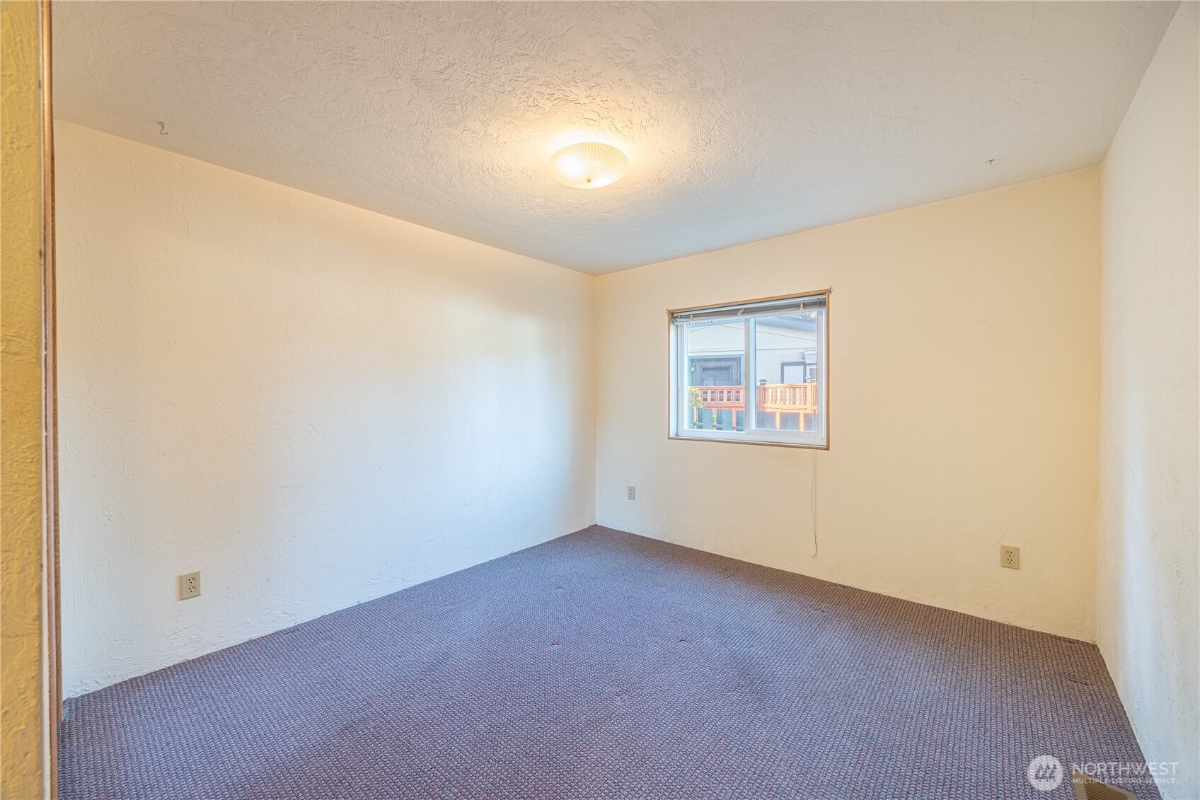 20 Ed's Place Sequim, WA 98382 - Photo 19 of 30 an empty room with a empty space and windows