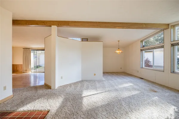 a view of an empty room and window