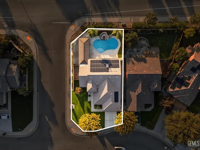 an aerial view of a house with a outdoor space