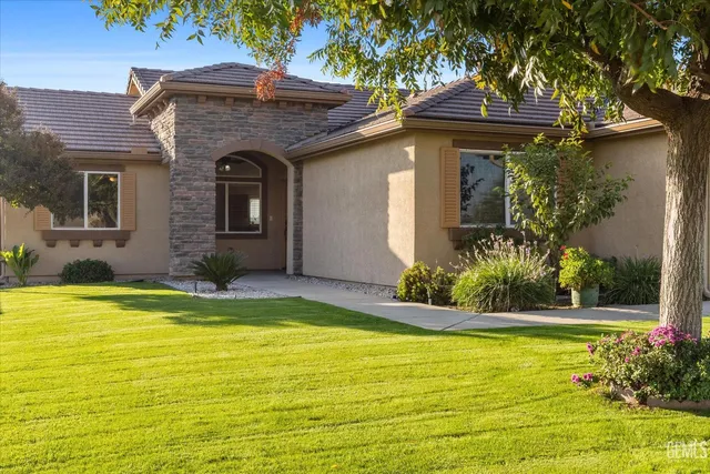 a view of a kitchen with a sink and a window