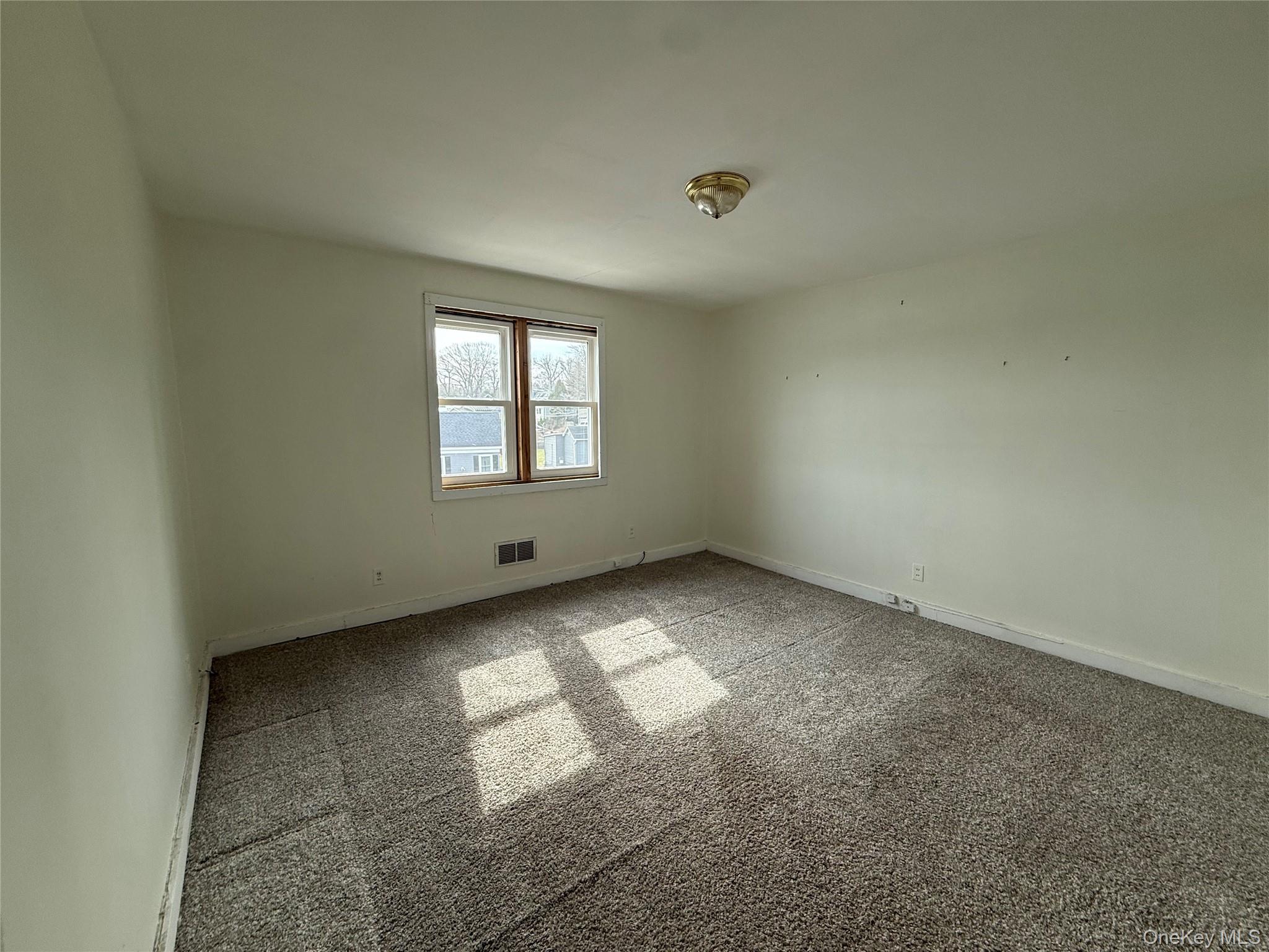 307 West Shore Road, Unit 5 Huntington, NY 11743 - Photo 7 of 12 Bedroom with water views