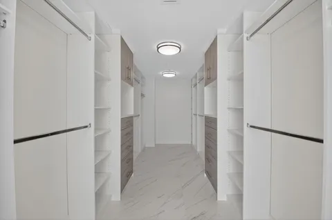 a view of an empty walk in closet