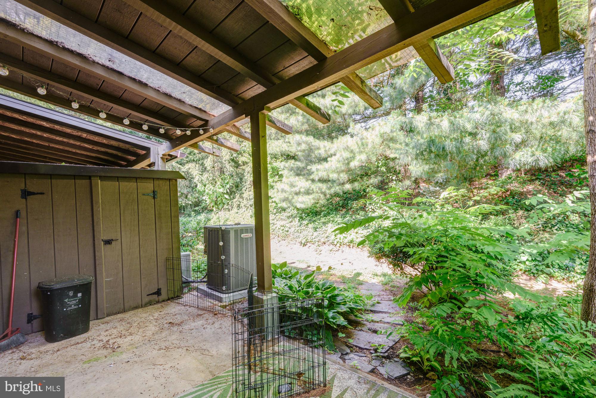 73 Wedge Lane Reading, PA 19607 - Photo 11 of 23 Serene outdoor retreat with lush greenery.