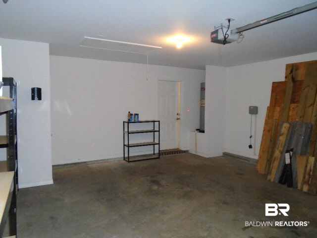 4 Martin Circle Foley, AL 36535 - Photo 32 of 37 Garage. All hurricane covers to remain with sale.