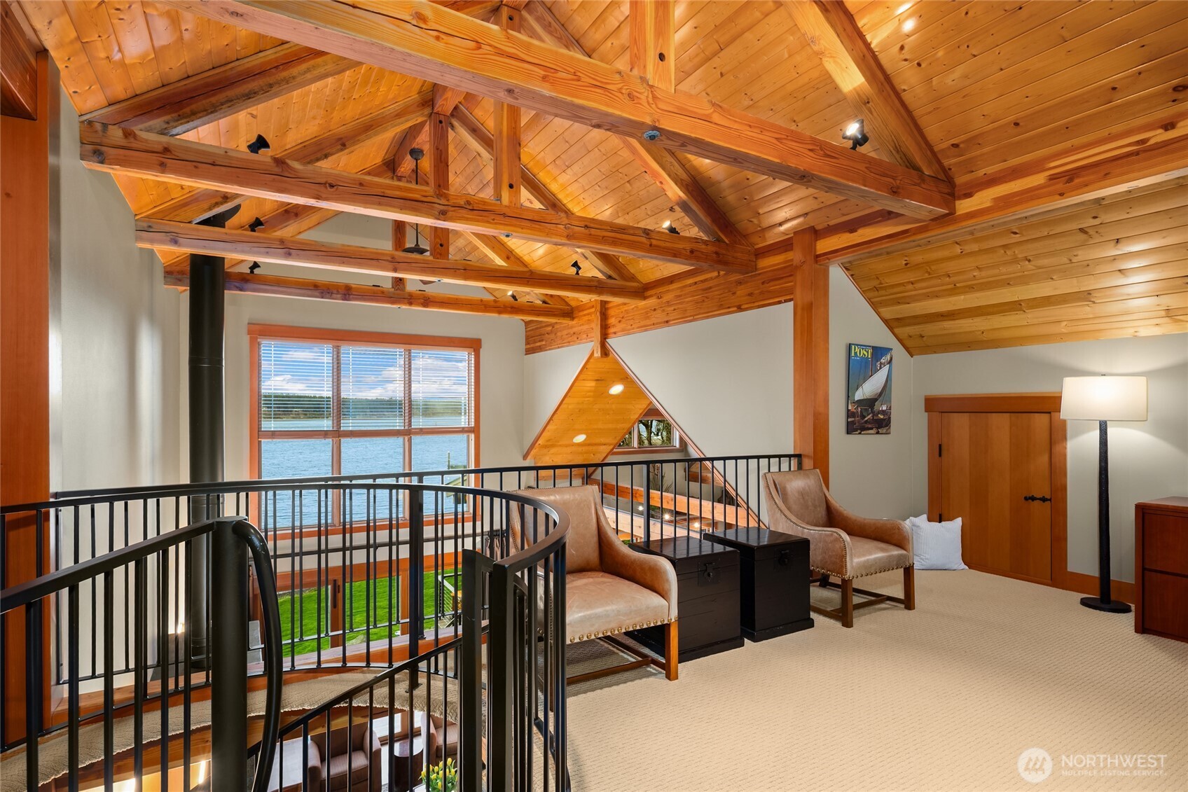 15550 Sandy Hook Road Northeast Poulsbo, WA 98370 - Photo 13 of 40 a view of staircase with furniture and wooden floor