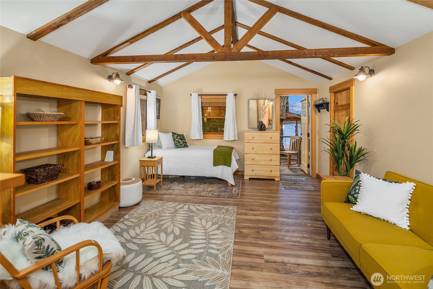 15550 Sandy Hook Road Northeast Poulsbo, WA 98370 - Photo 27 of 40 a living room with furniture and wooden floor