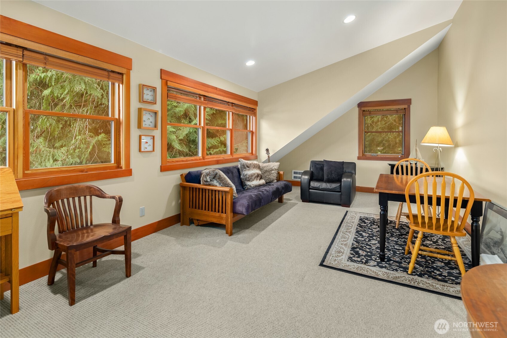 15550 Sandy Hook Road Northeast Poulsbo, WA 98370 - Photo 29 of 40 a bedroom with furniture and a window