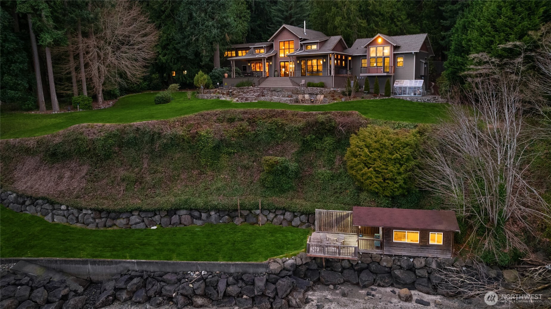 15550 Sandy Hook Road Northeast Poulsbo, WA 98370 - Photo 35 of 40 a view of a big yard next to a yard
