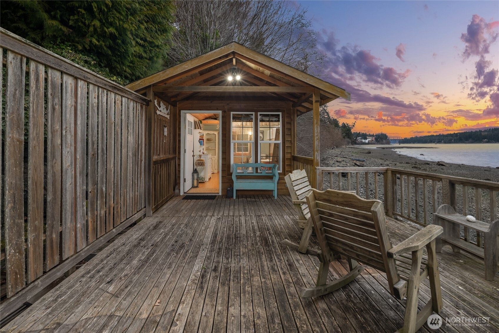 15550 Sandy Hook Road Northeast Poulsbo, WA 98370 - Photo 36 of 40 a view of a roof deck with wooden floor and fence