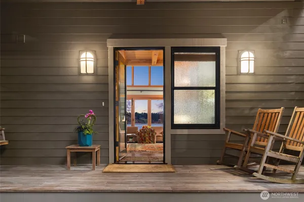 a potted plant sitting in front of a door