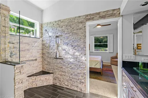 a living room with granite countertop furniture and a window
