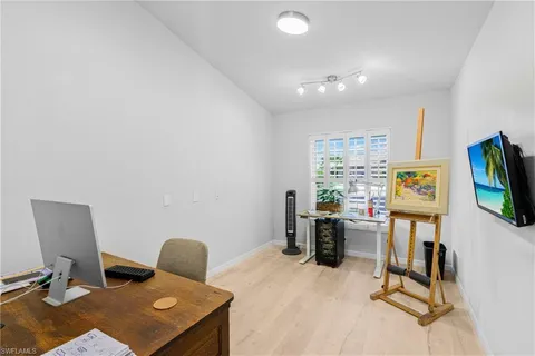 a view of storage and utility room with washer and dryer