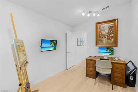 a view of a room with racks on the wall