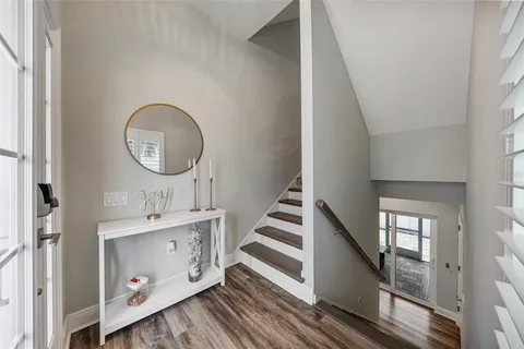 a view of a hallway with washer and dryer