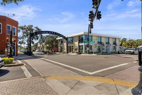 a view of street with houses and trees