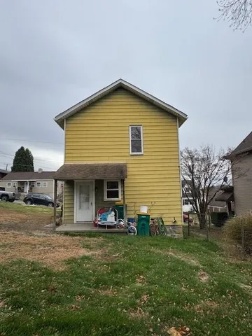a front view of house with yard