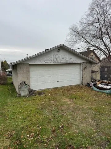 a view of a backyard of the house