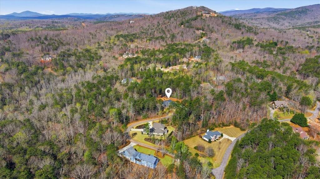 196 Red June Lane Clarkesville, GA 30523 - Photo 56 of 69 an aerial view of residential house with green space and mountain view
