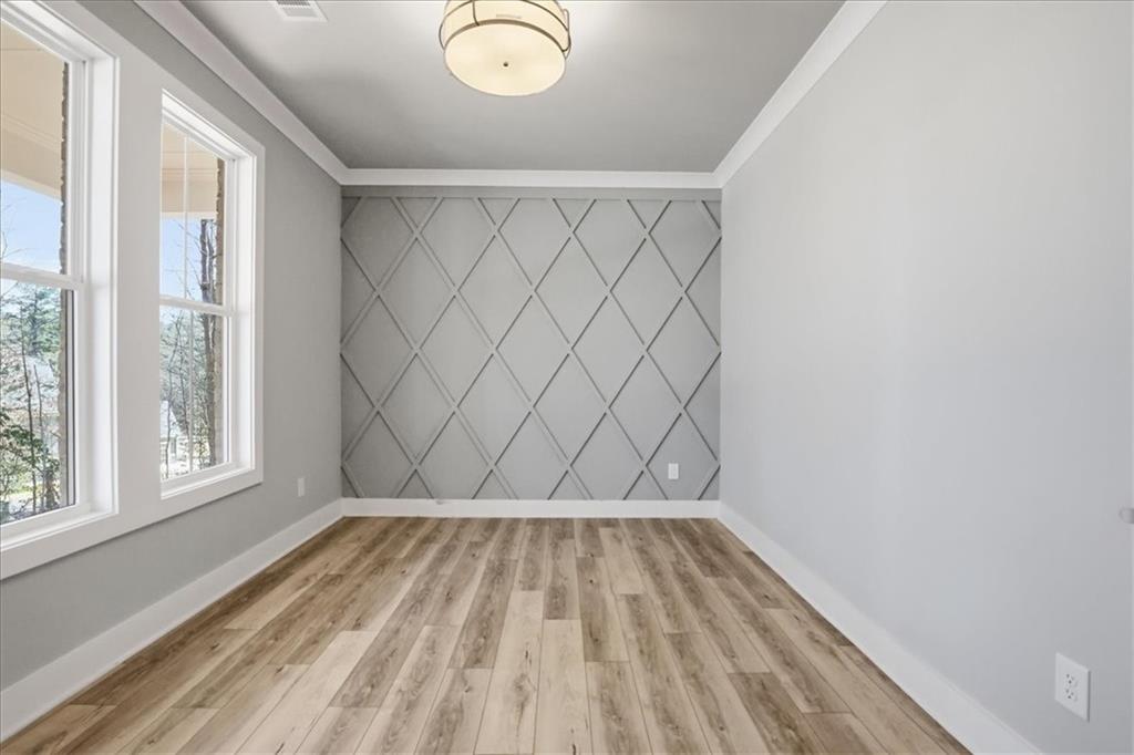 196 Red June Lane Clarkesville, GA 30523 - Photo 6 of 69 a view of room with window and hardwood floor