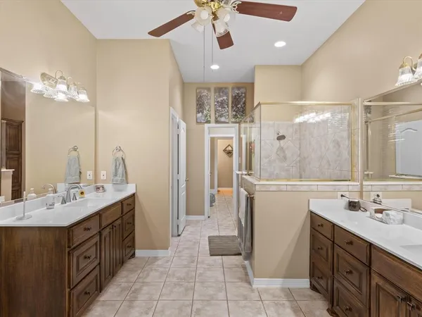 a bathroom with a sink a vanity and a mirror