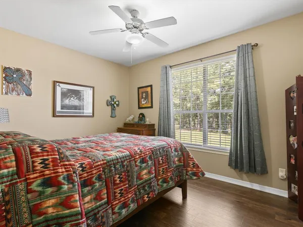 a bathroom with a toilet a sink and bathtub