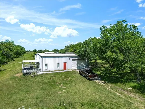 a view of a lake with a big yard
